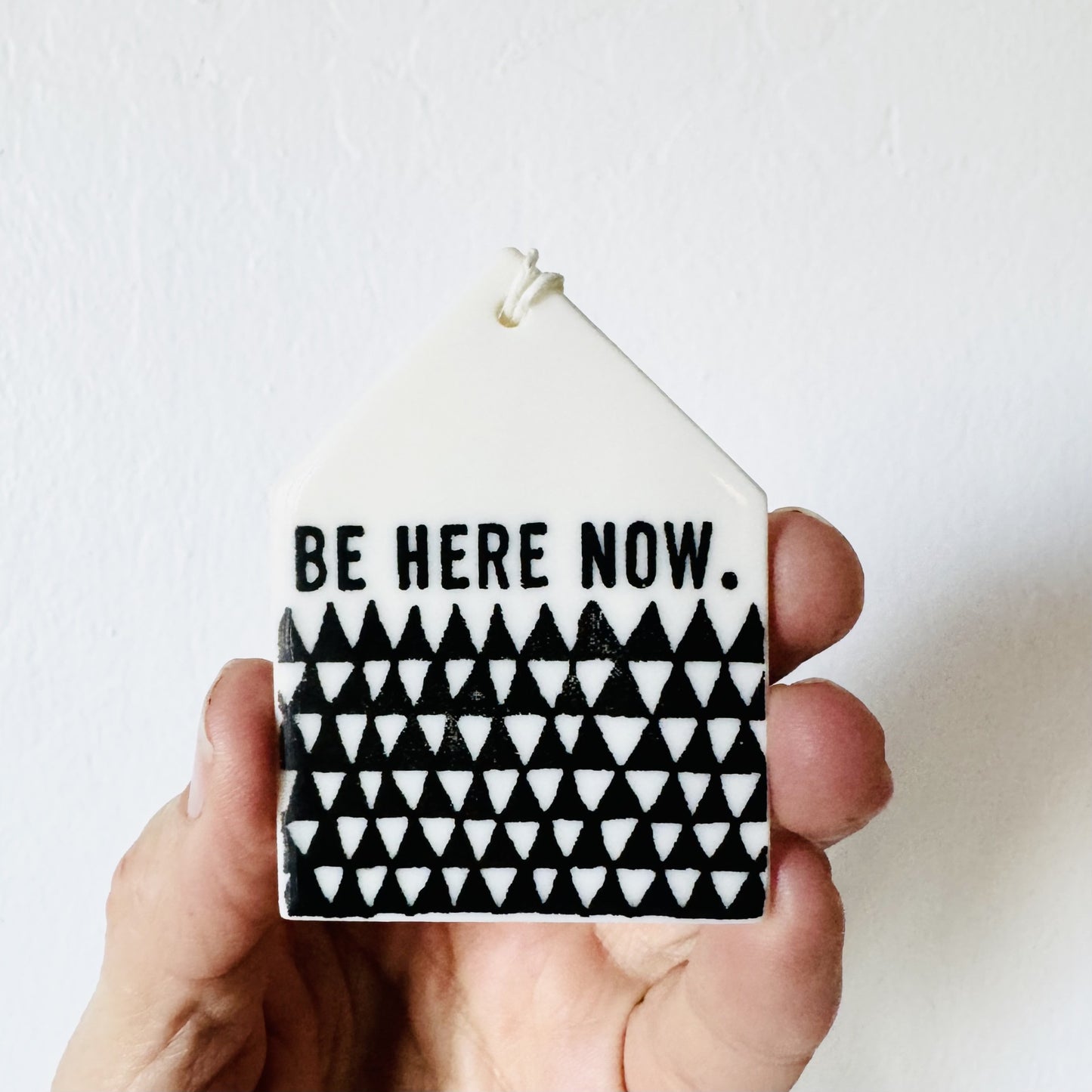 be here now ceramic wall tag