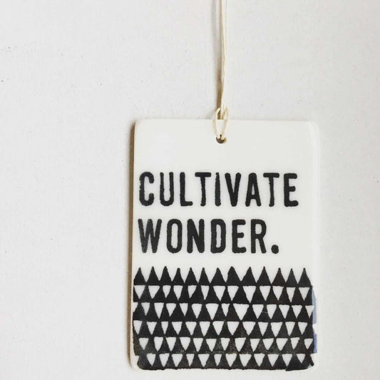 cultivate wonder ceramic wall tag
