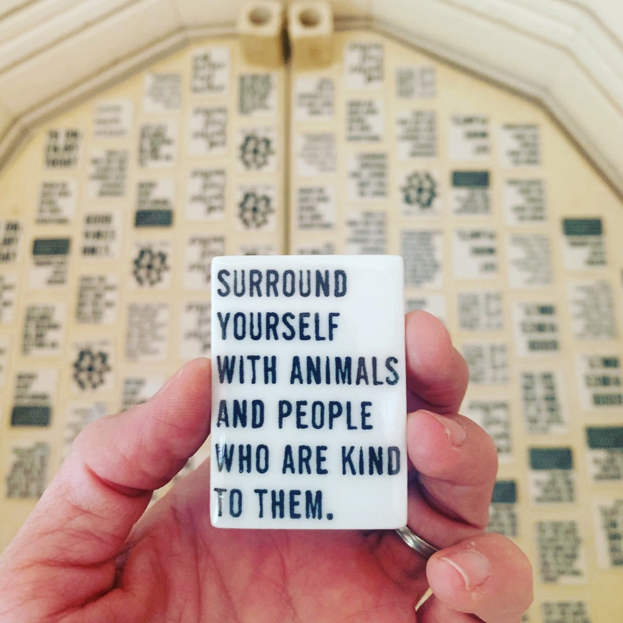 surround yourself with animals... ceramic magnet 1.56" w x 2.13" h