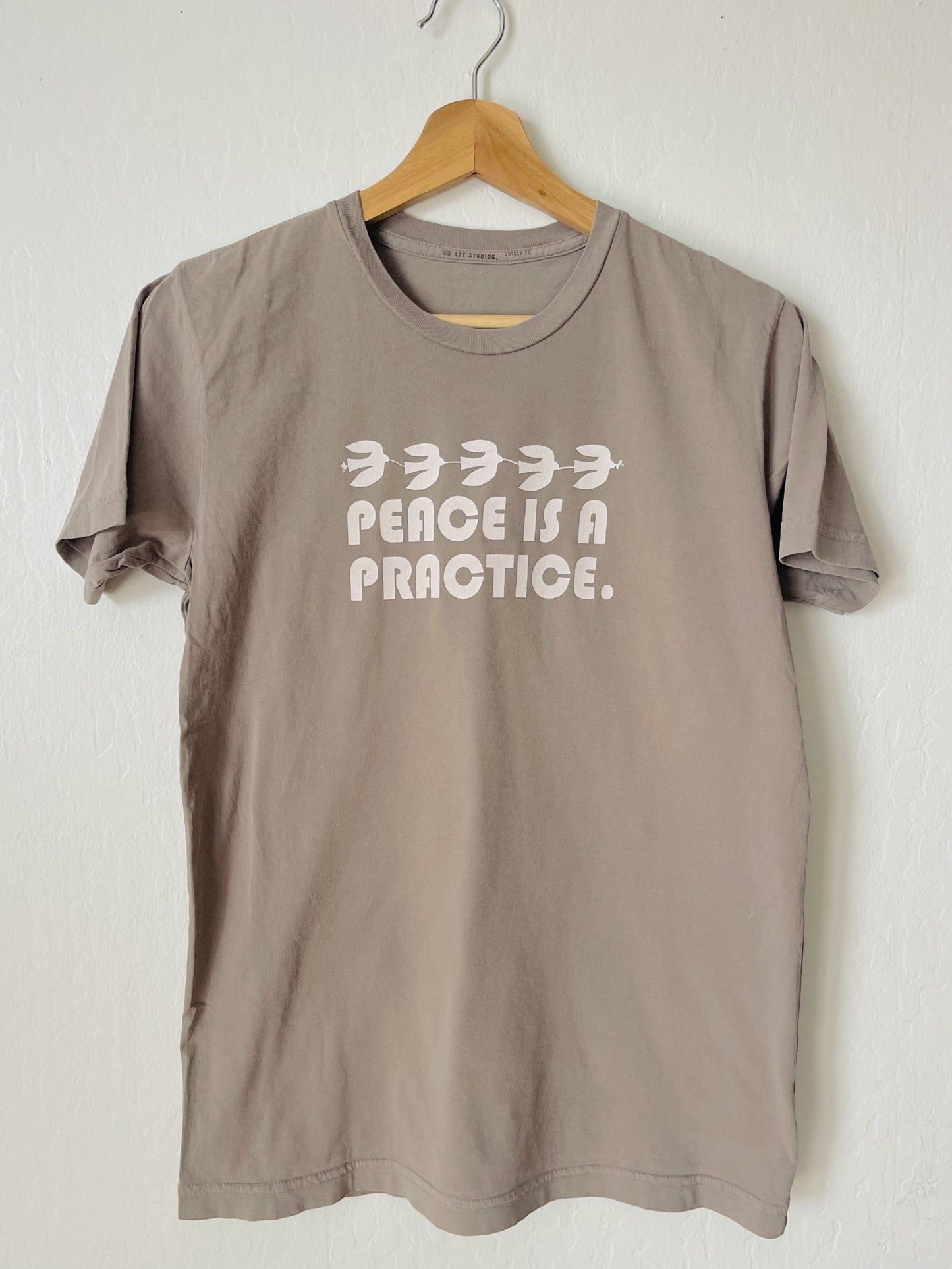 UNISEX 100% jersey cotton t-shirt screen printed with water based ink made, printed and sewn in usa.