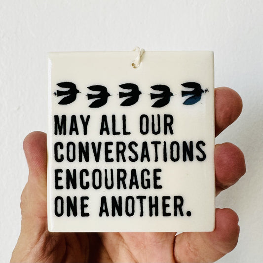 may all our conversations encourage one another ceramic wall tag