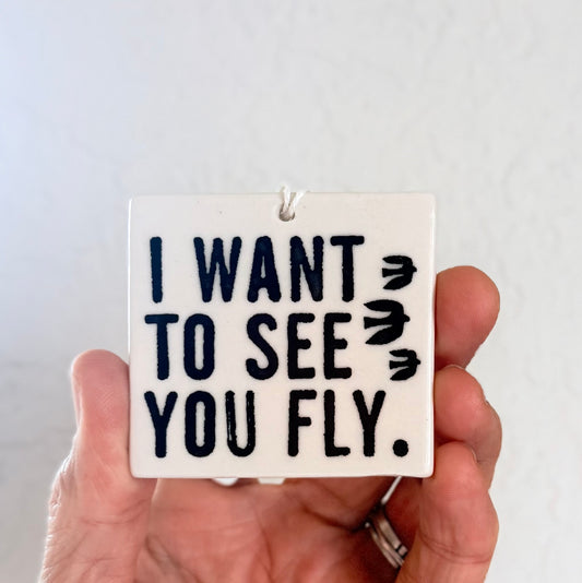 Porcelain wall tag: I want to see you fly