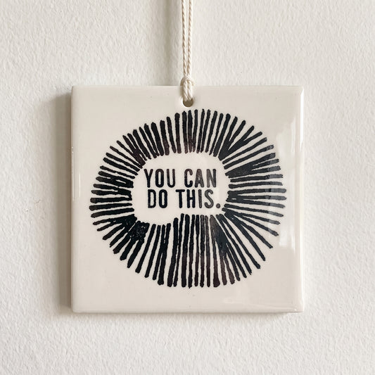 Porcelain wall tag: YOU CAN 
DO THIS.