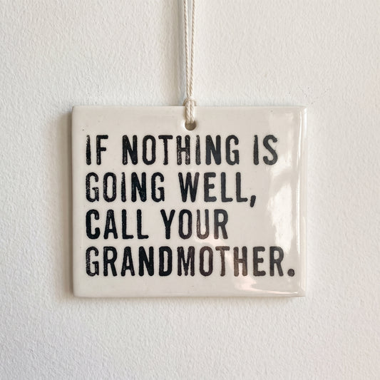 Porcelain wall tag: if nothing is going well, call your grandmother.