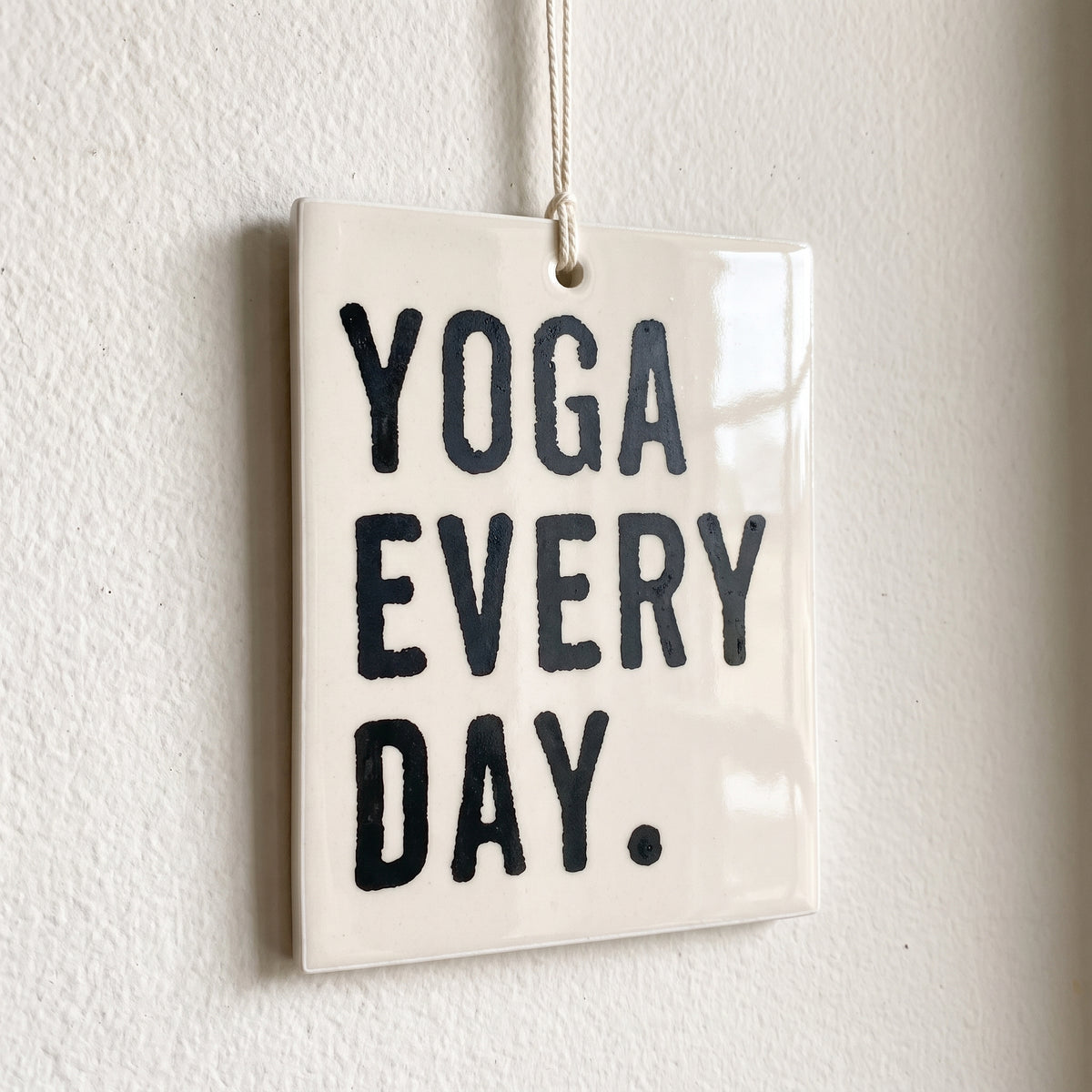 Porcelain wall tag: yoga
every
day.