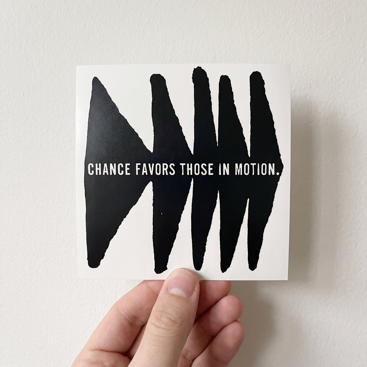 Vinyl sticker: chance favors those in motion.