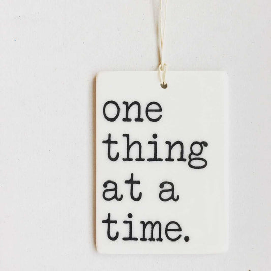 one thing at a time ceramic wall tag