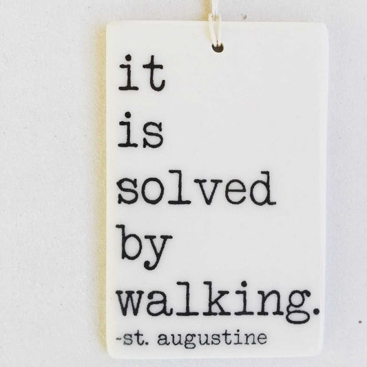 st augustine quote | walking | ceramic wall tag | ceramic wall tile | ceramic wall art | screenprinted ceramics | it is solved by walking