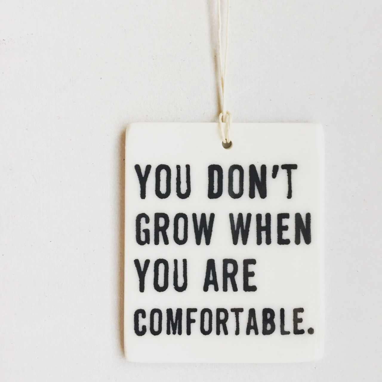 you don't grow when you are comfortable ceramic wall tag
