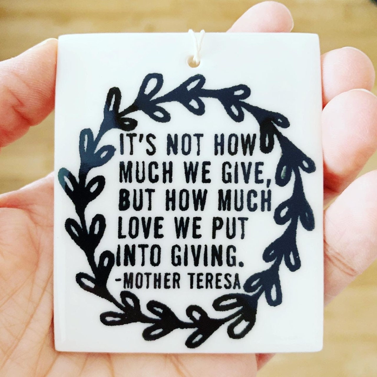 porcelain wall tag screenprinted text it's not how much we give, but how much love we put into giving. -mother teresa