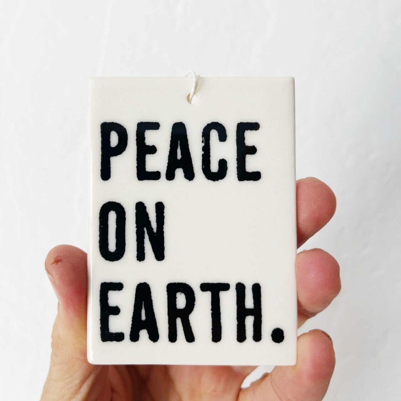 peace on earth | ceramic wall tag | ceramic wall art | peace sign | daily remcinder | christmas ornament | christmas gift