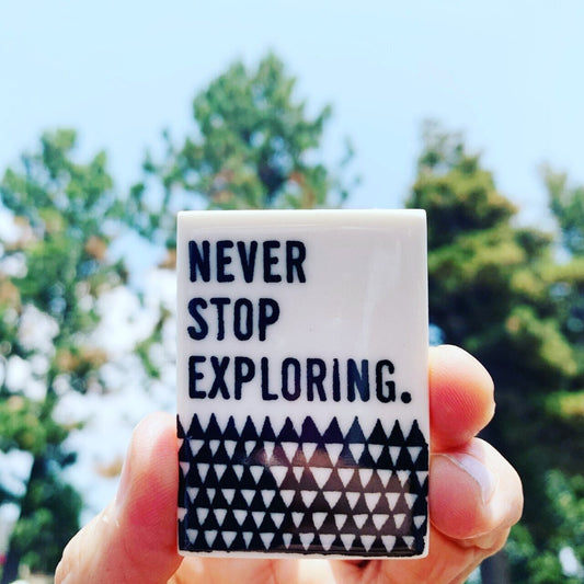 never stop exploring | ceramic magnet | ceramic magnet | screenprinted ceramics | fridge magnet | nature | get outside | travel